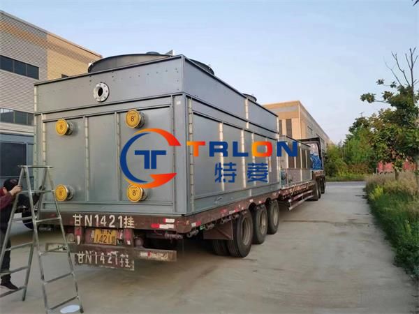 What is the reason for water leakage in a closed cooling tower?